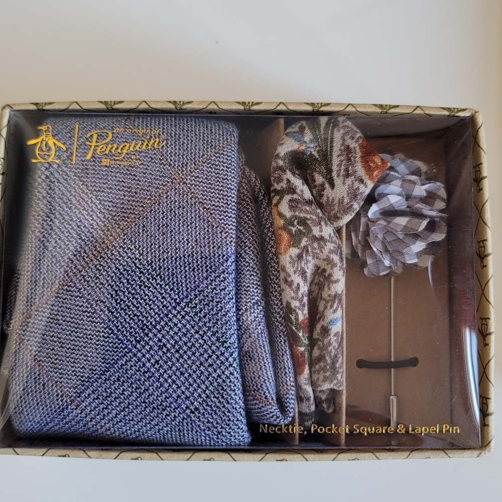 Tie, lapel pin and pocket square set
